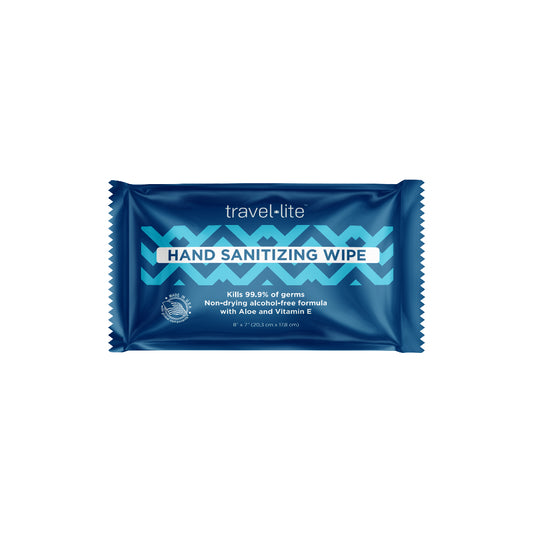 A blue travel-sized hand sanitizing wipe packet with white wave patterns and product information.