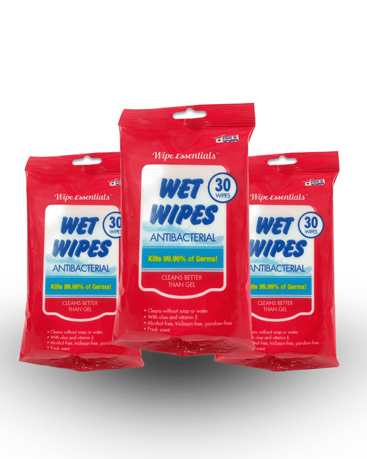 Three packs of Wipe Essentials Wet Wipes on a white background