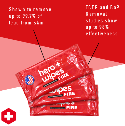 Firefighter using Hero Wipes decontamination wipe after fire scene — removes carcinogenic contaminants before shower access 